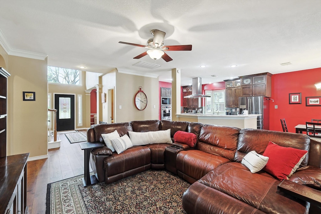 Tastefully furnished with your comfort in mind, this living room offers a homey appeal with plenty of seating for all guests on the oversized sectional.