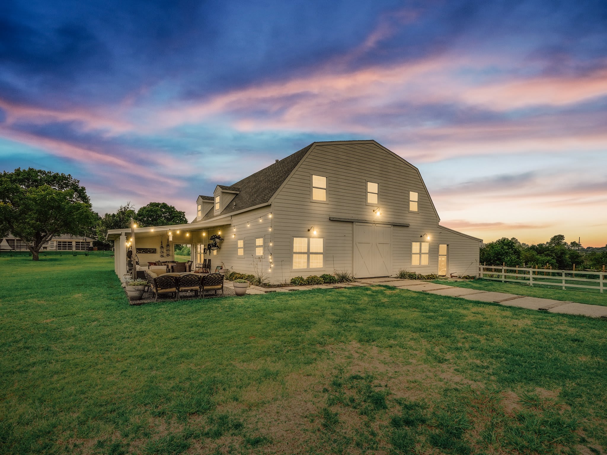 Featuring 5 bedrooms and 3 bathrooms, let this rustic charming barndominium be your next home away from home!