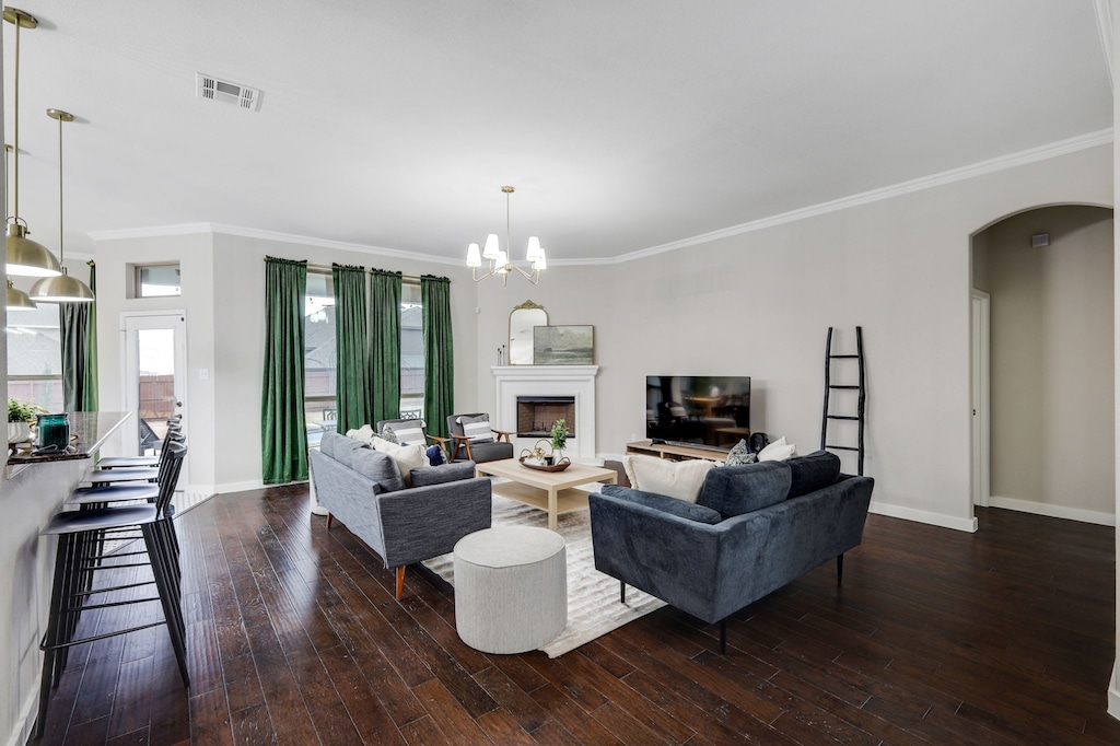 With two couches, two sofas, and a coffee table as well as a designer rug, and curated décor, this living room has been designed to instantly put you at ease!