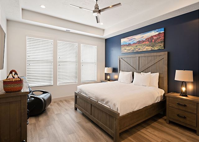 Main floor master bedroom with fully adjustable king bed
