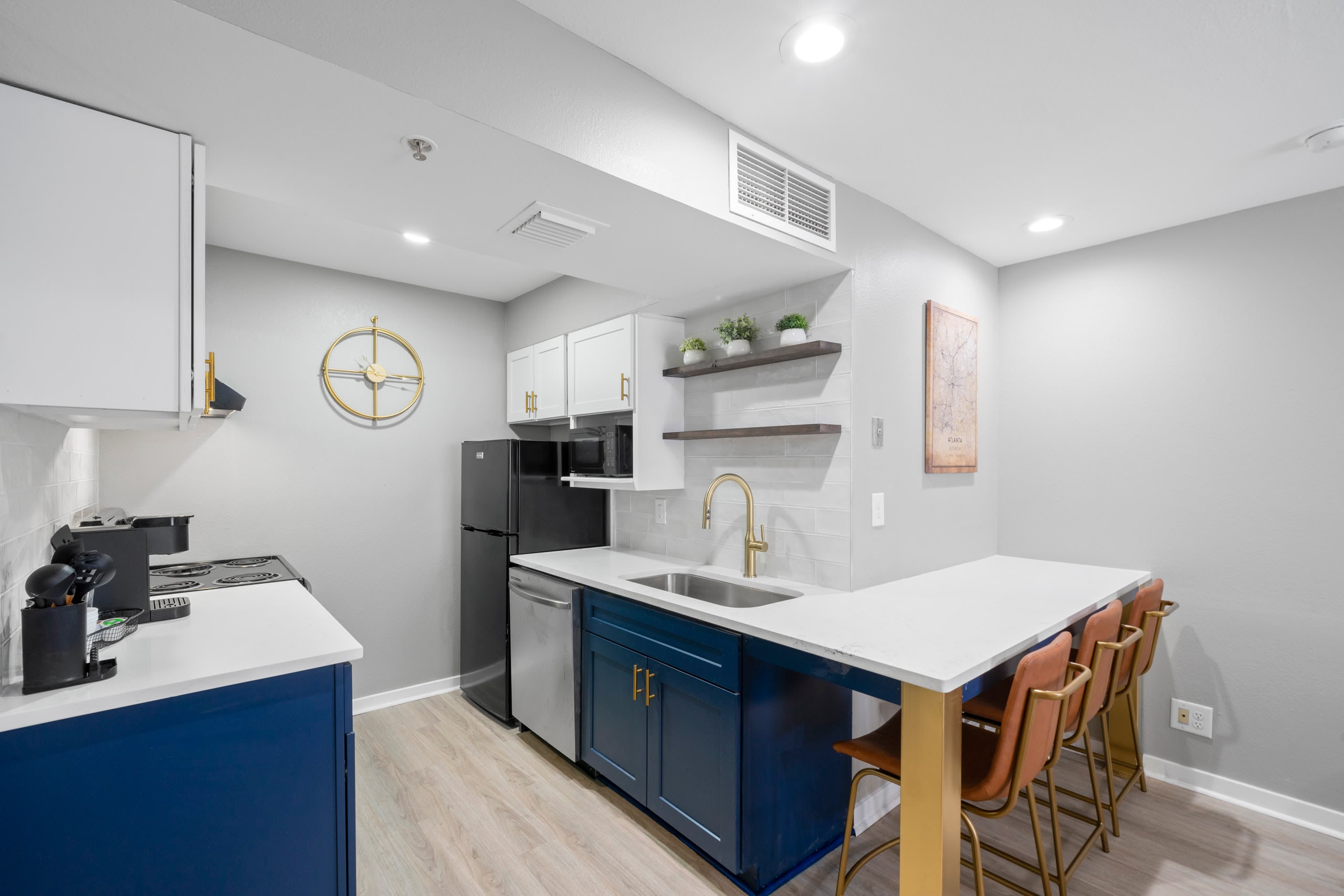 Renovated kitchen with breakfast bar/ workstation