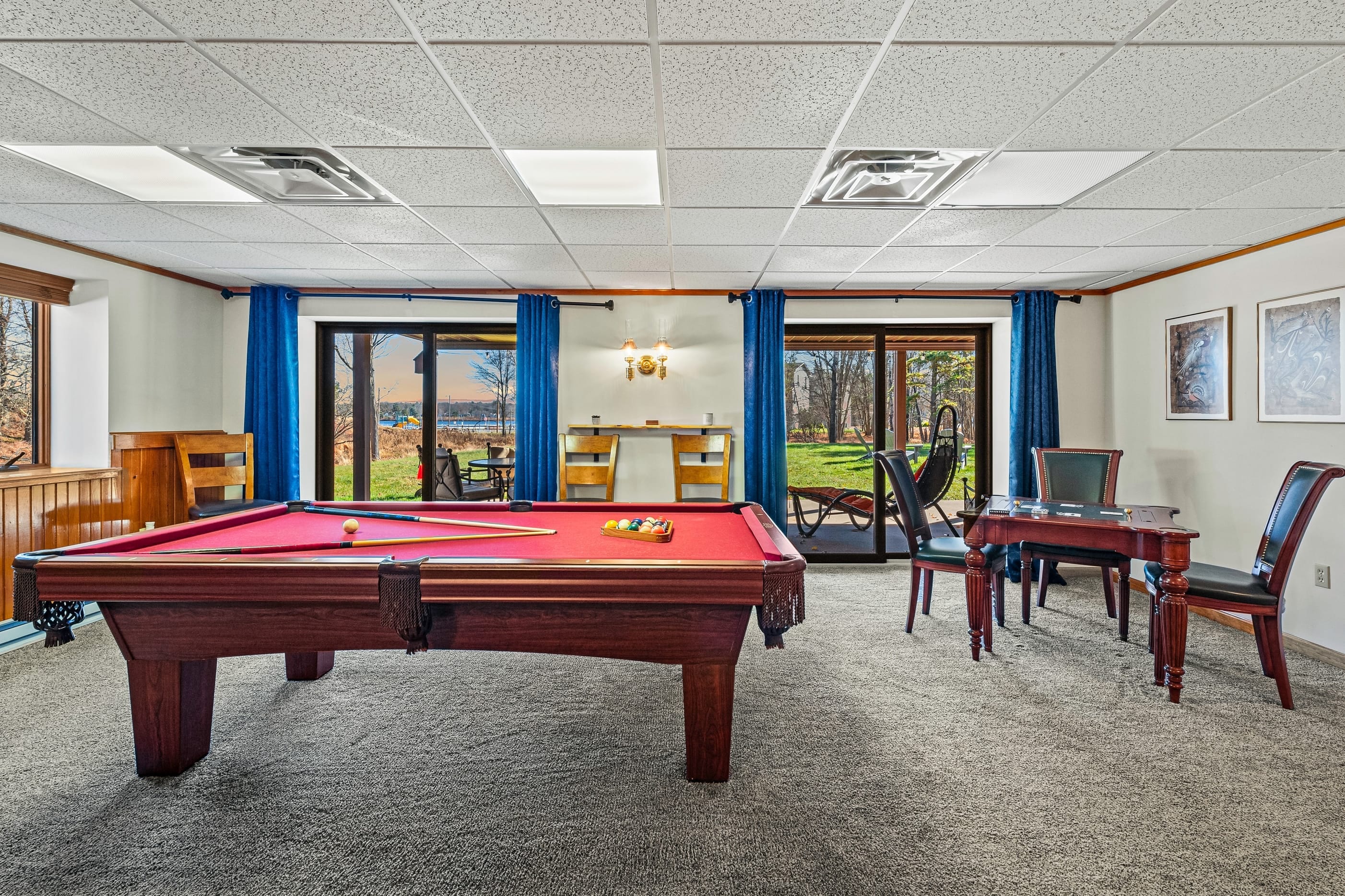 Game room with a pool table.