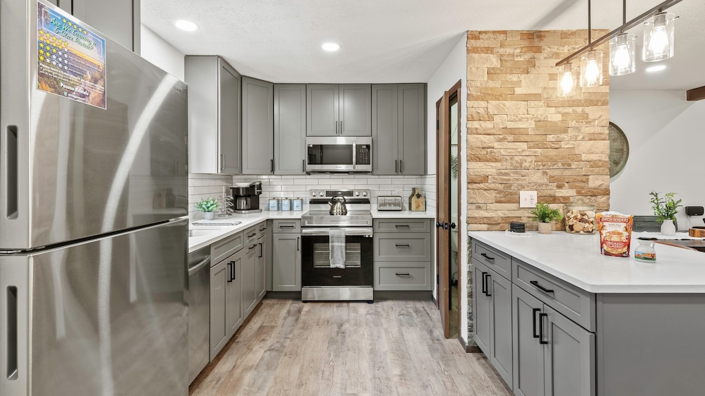 Spacious kitchen: With ample counter space and cabinets, this kitchen provides plenty of room for cooking and entertaining.