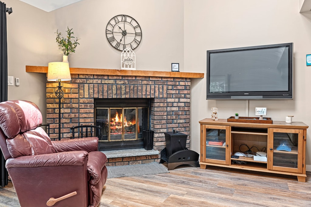 Living area with fireplace for cozy nights.