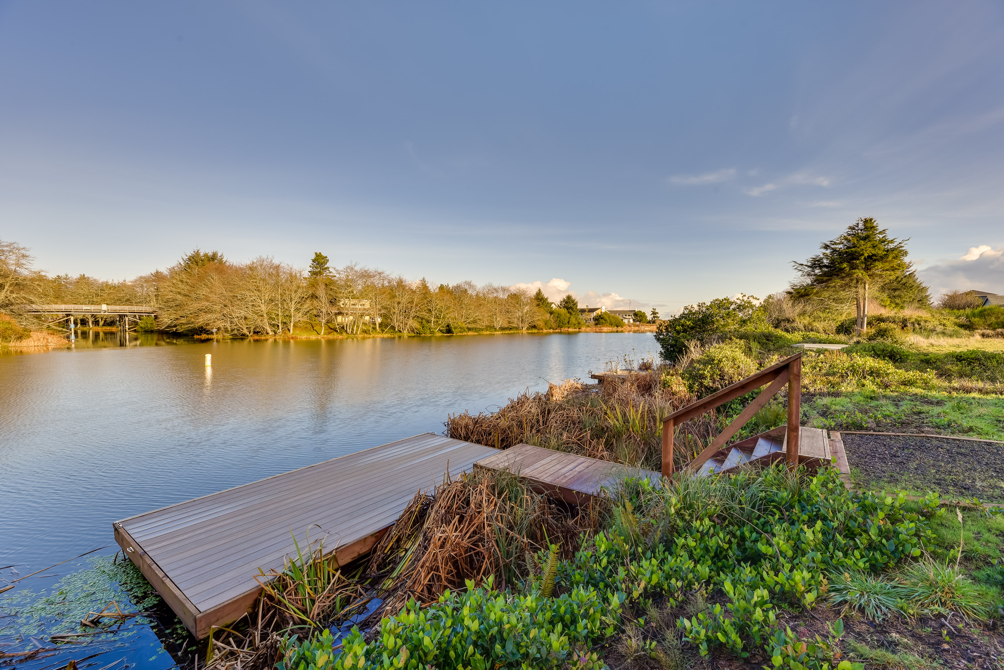 Property Image 1 - Canal-Front Home in Ocean Shores w/ Dock & Views!