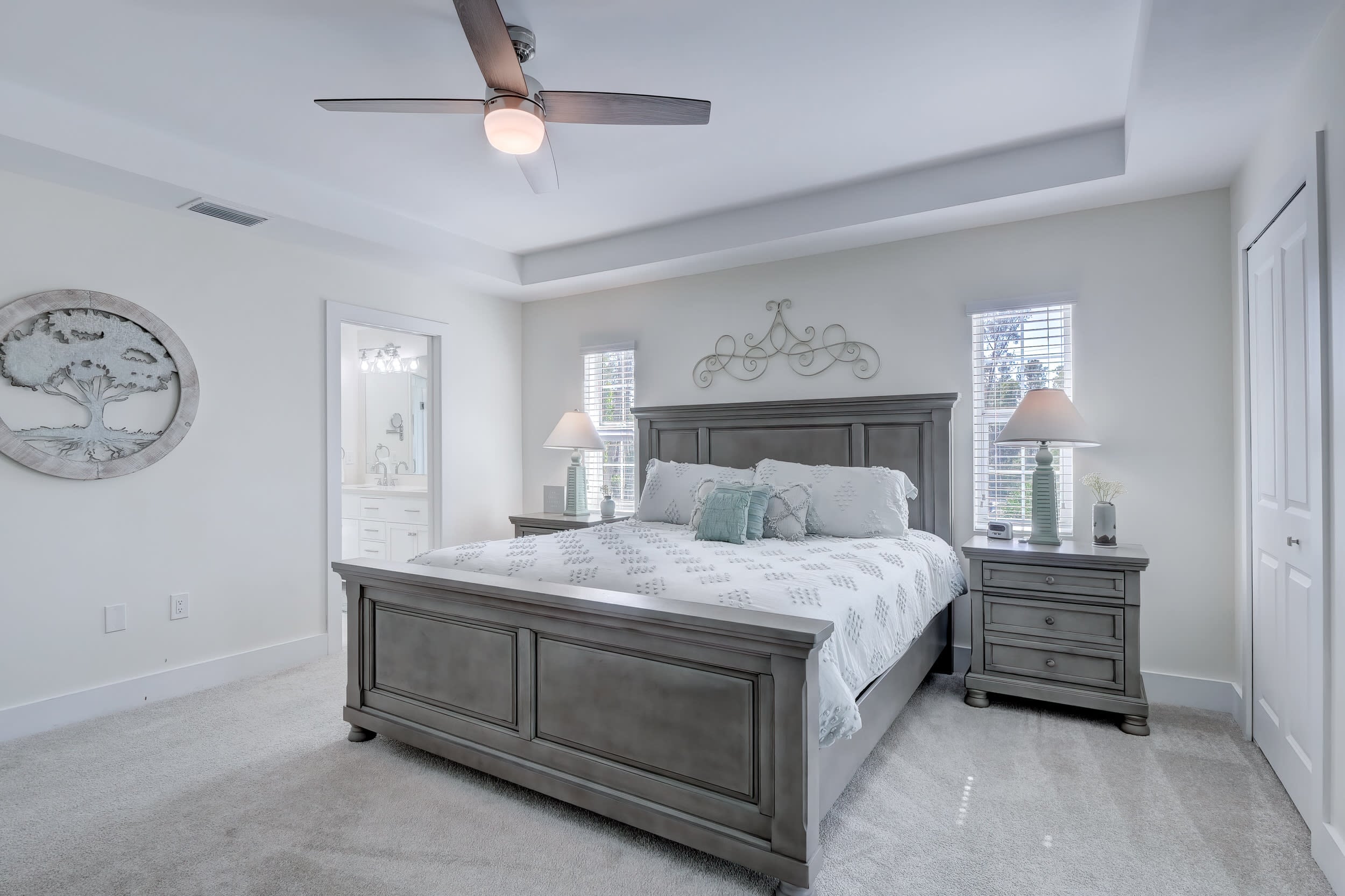 The Main Bedroom Suite With an Attached En Suite Bathroom