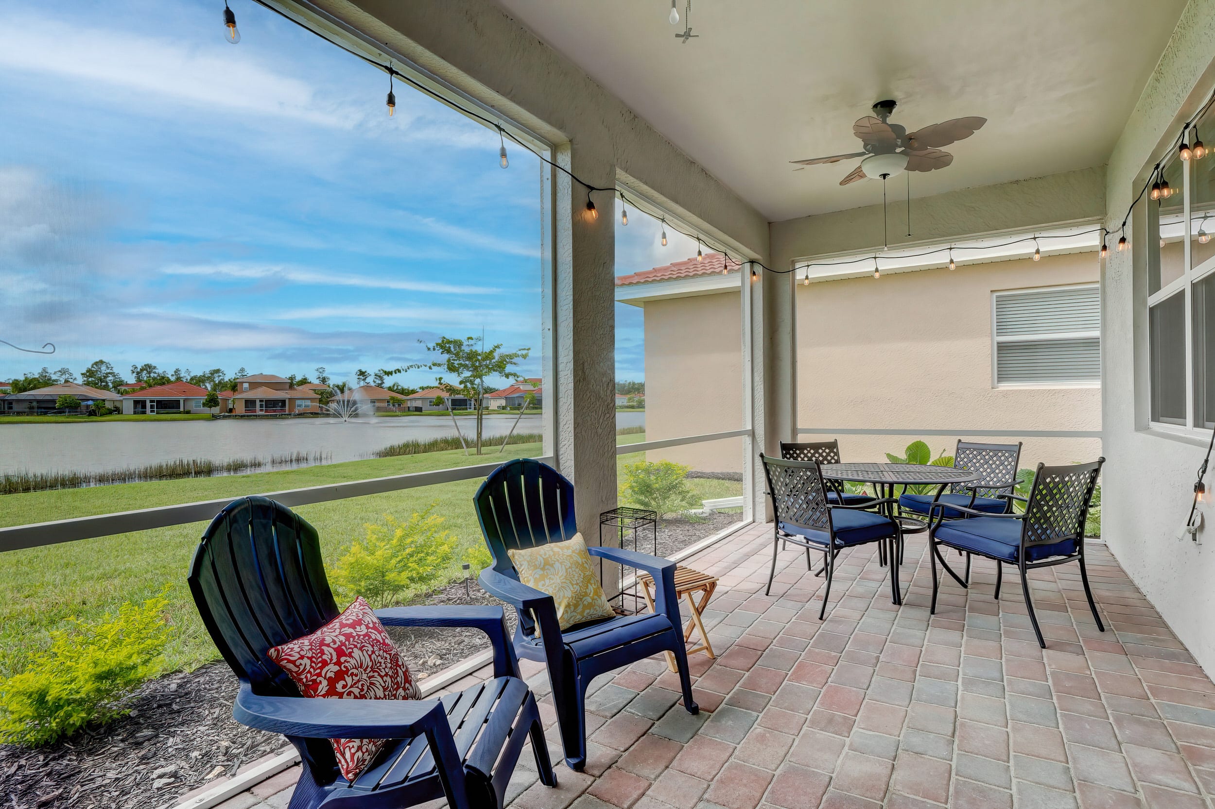 The Completely Screened Lanai Has Outdoor Dining and Seating