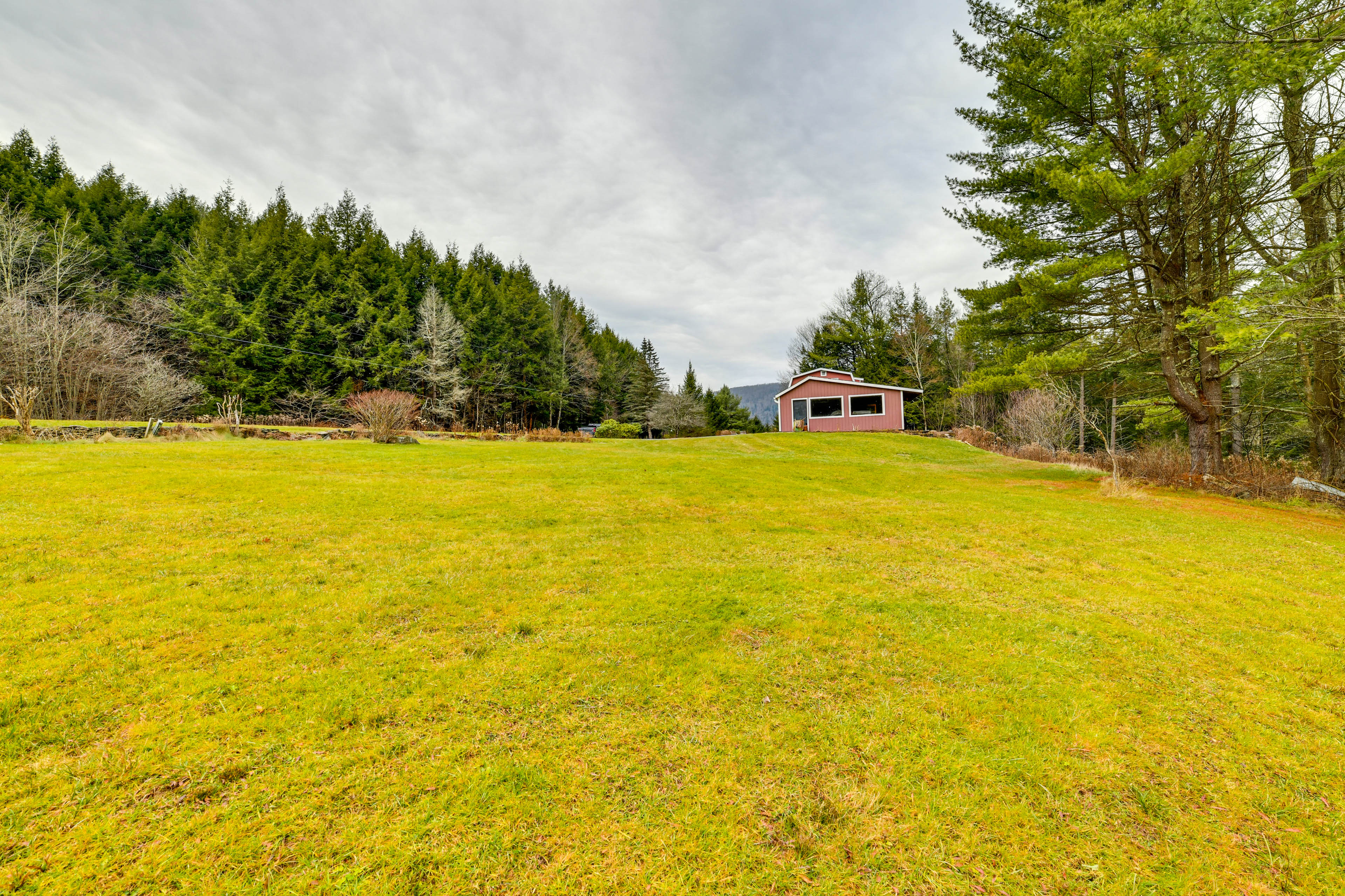 Property Image 1 - Wooded Walton Home with Fire Pit & On-Site Pond!