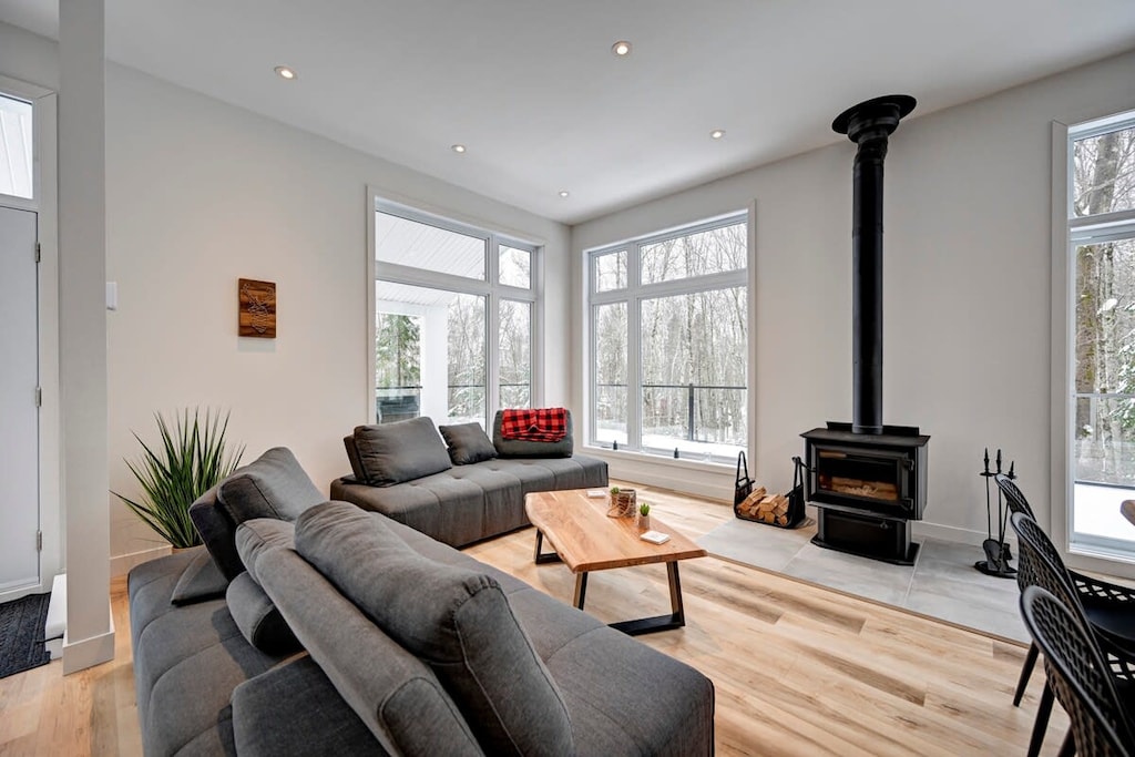 Warm, inviting living space with wood fireplace.