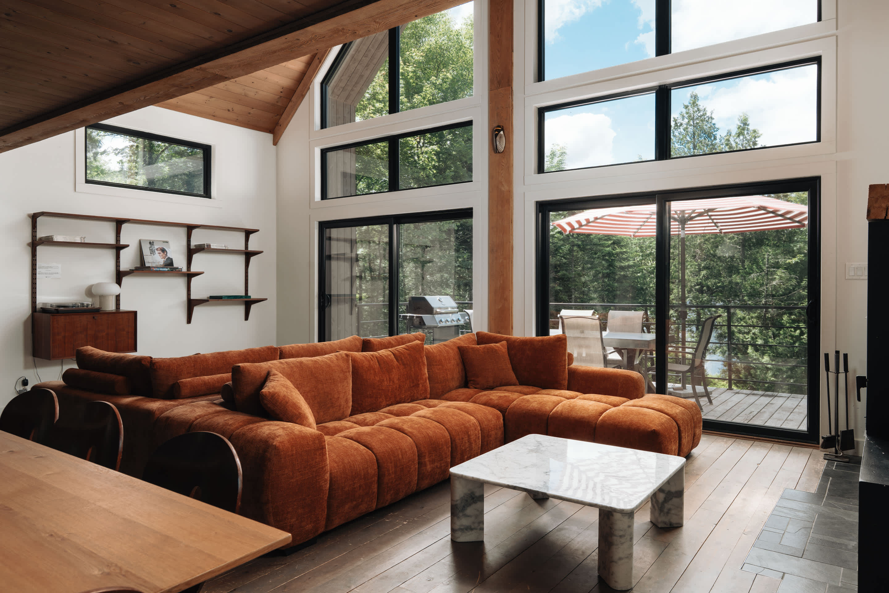 Indulge in the forest's beauty through the windows.