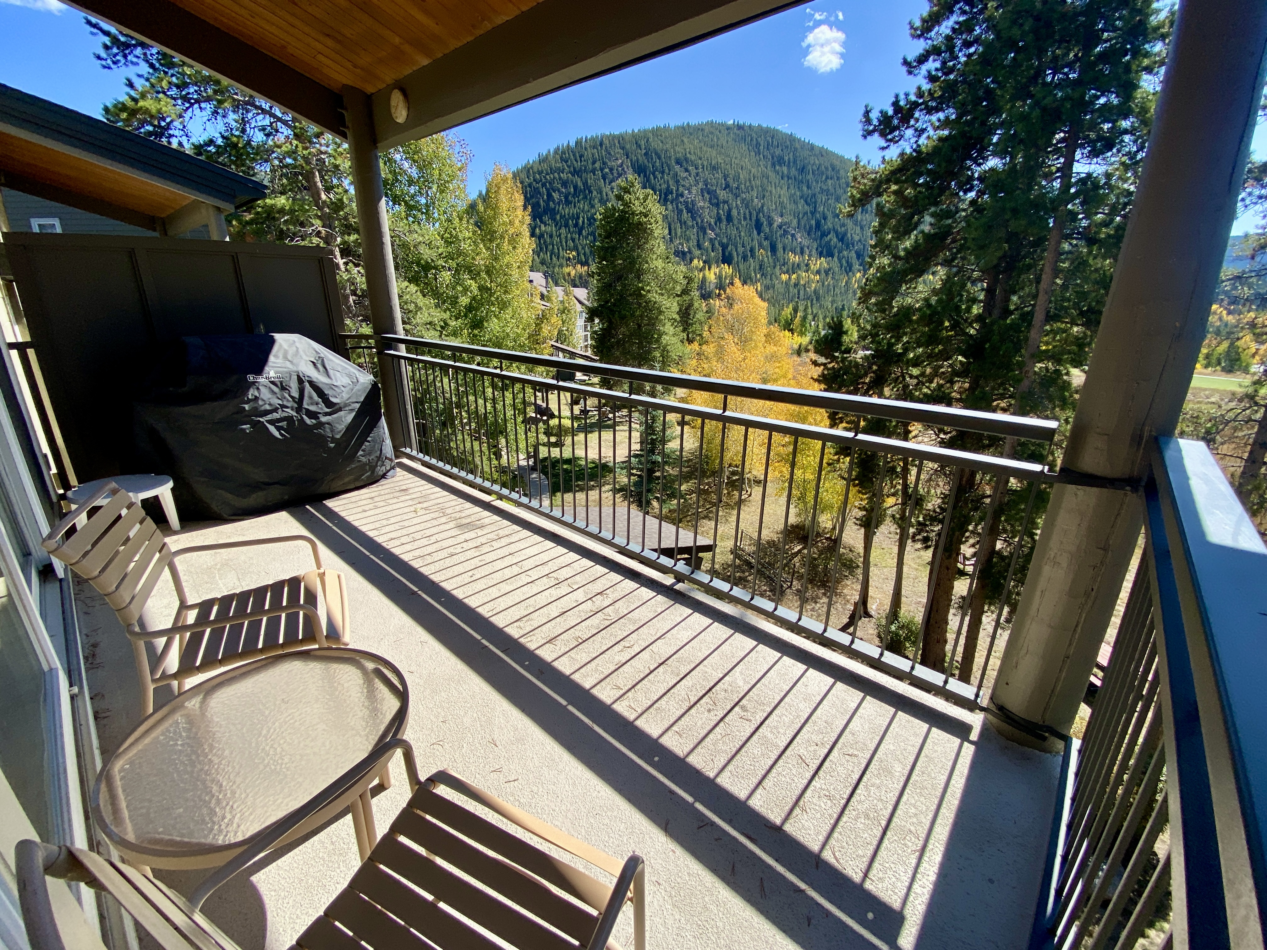 Private porch with mountain and golf course views