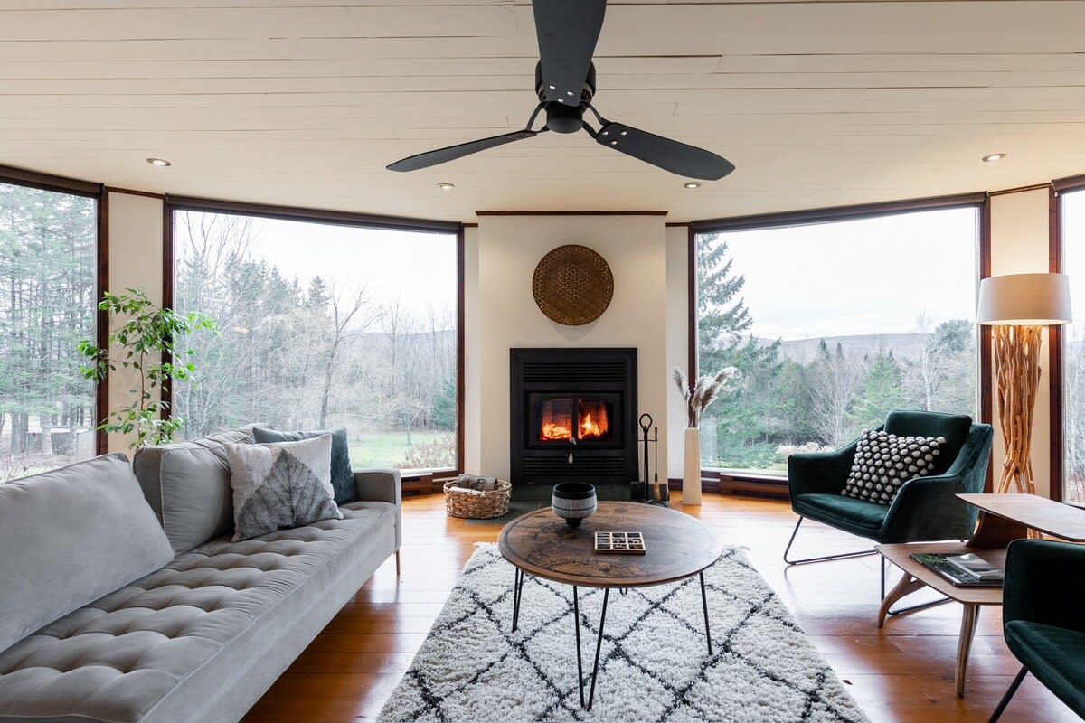 Welcome to L'Orford, crackling fire and mountain views welcome you home