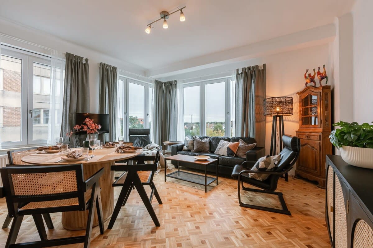 Cozy living room with lots of natural light and wooden accents