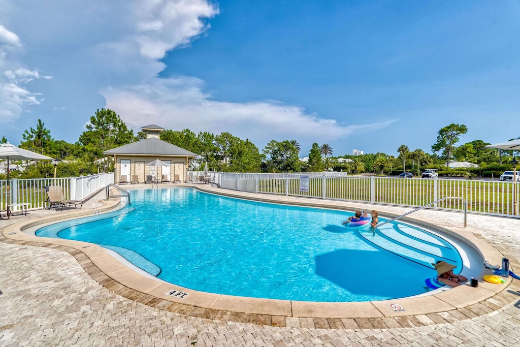 Community pool is footsteps from the home