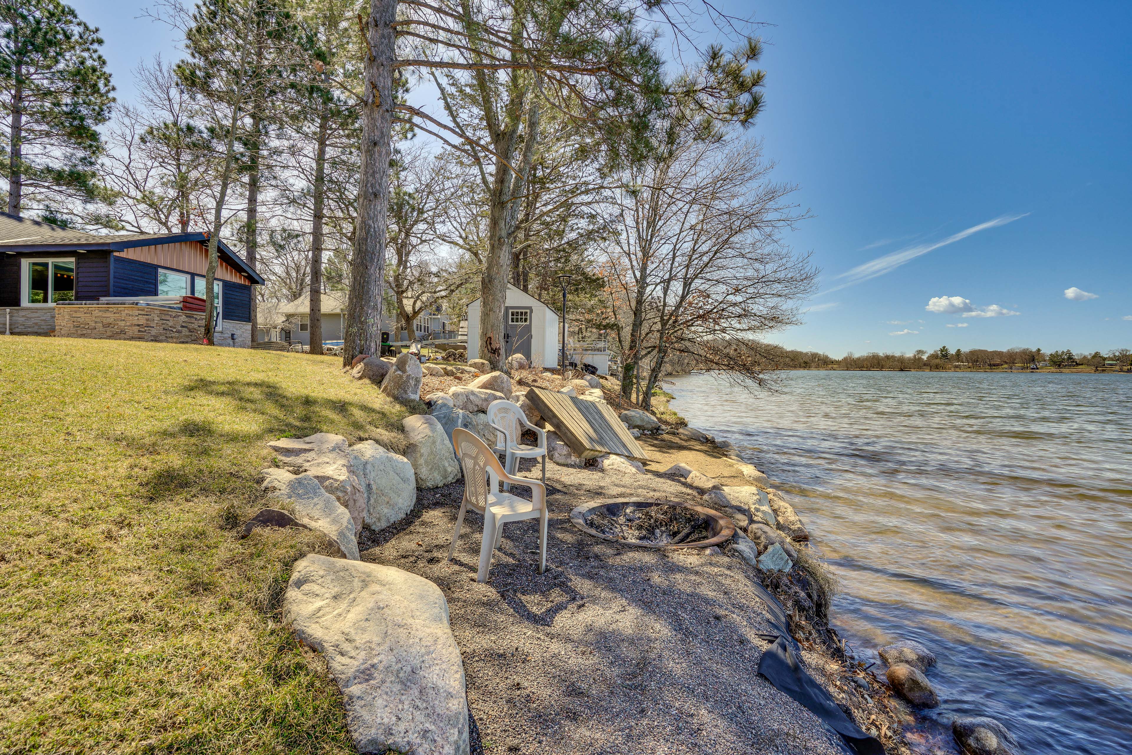 Property Image 1 - Hot Tub + Dock: Lakefront Cabin in Zimmerman!