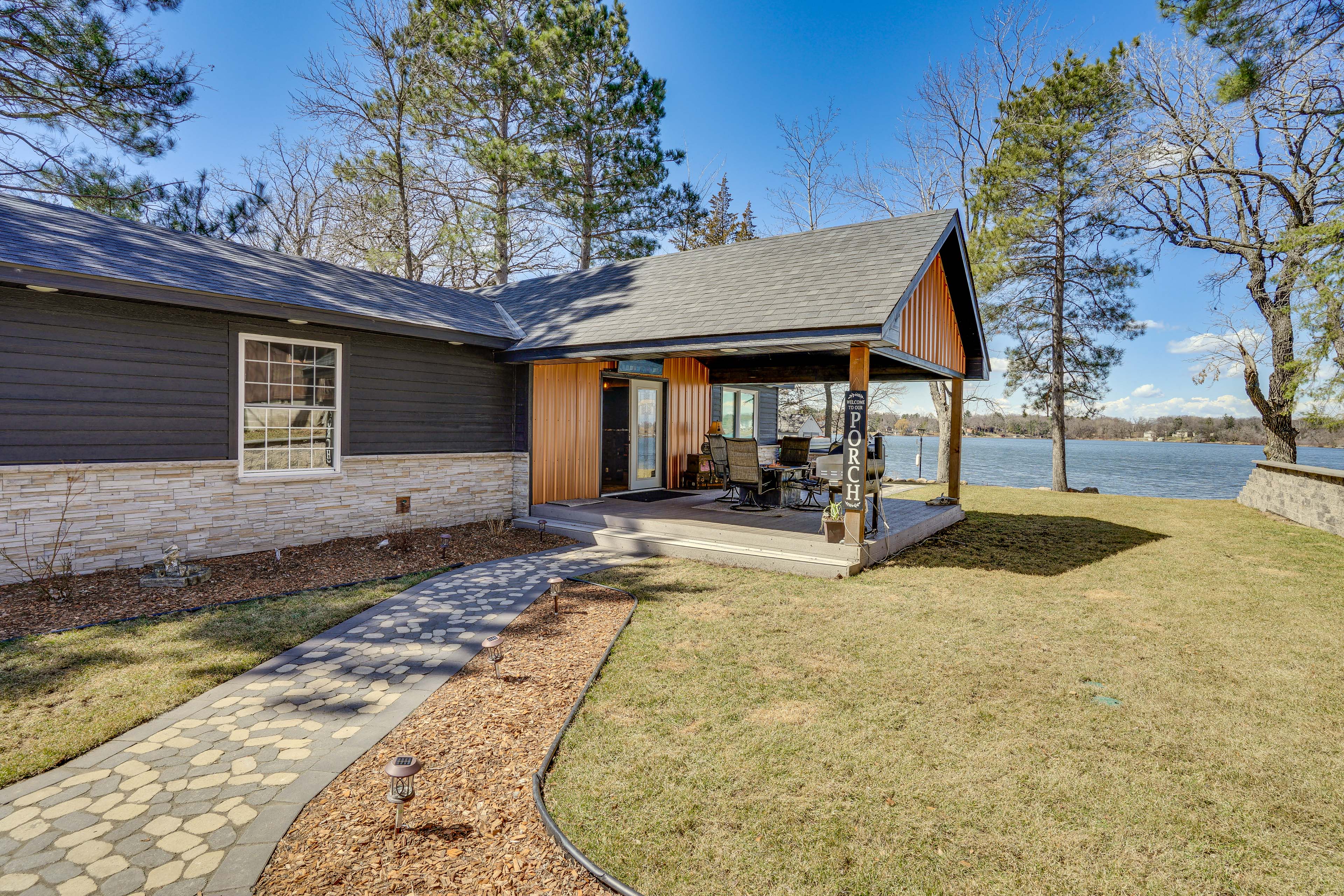 Property Image 2 - Stylish Lakefront Cabin in Zimmerman w/ Hot Tub!