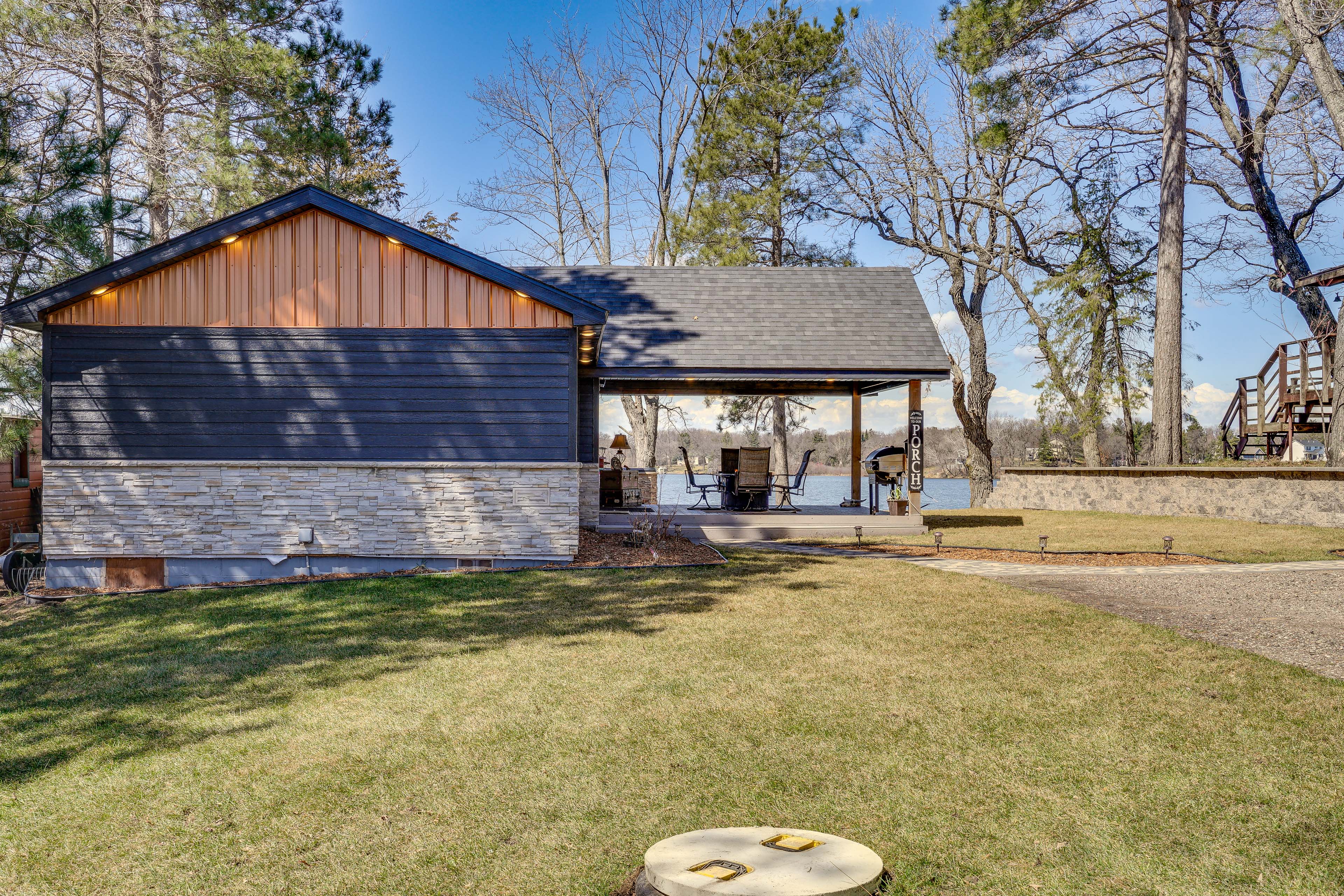 Property Image 1 - Stylish Lakefront Cabin in Zimmerman w/ Hot Tub!