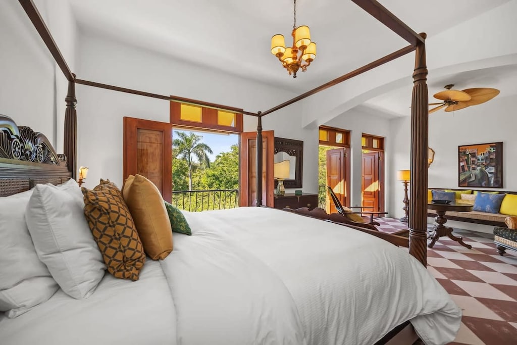 The four-poster mahogany king-size at the second level master suite.