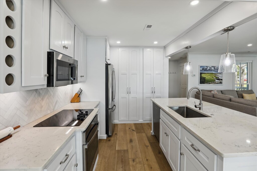 Kitchen with Stainless Steel Appliances at 4 Lands End Court