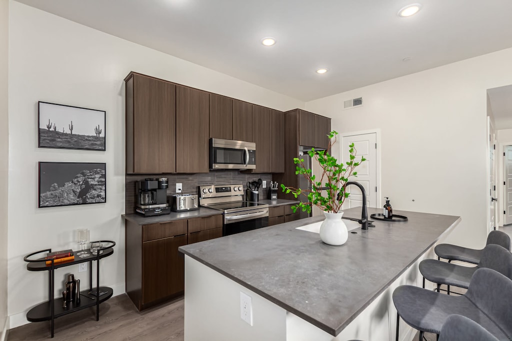 Ultra Modern Kitchen with Island Seating for 4