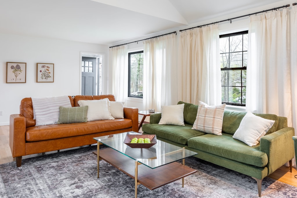 Unwind in the comfortable living room with a large TV.