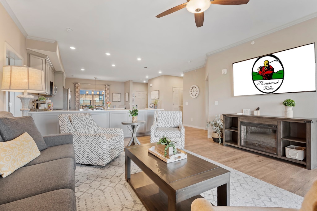 Beautifly Furnished Living Room with Cable TV, Sunroom, and Deck Access