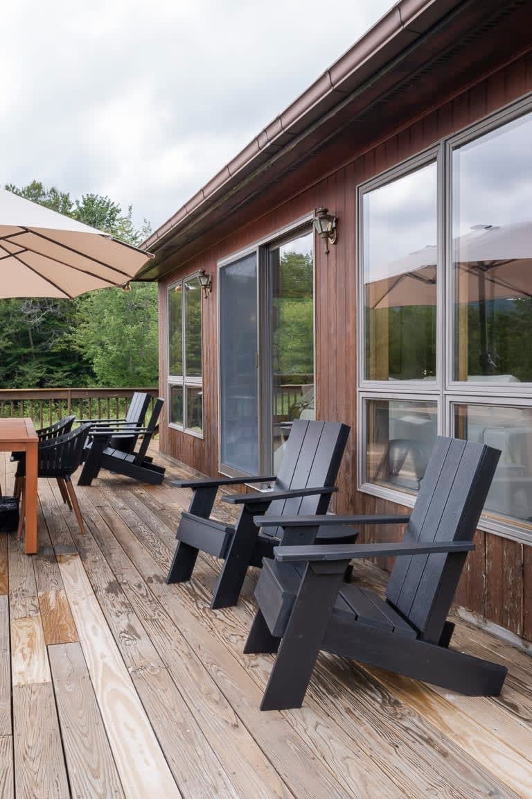 Step out to the elevated deck directly from the living room for morning coffee or a delicious dinner overlooking mountain views in the fresh mountain air.