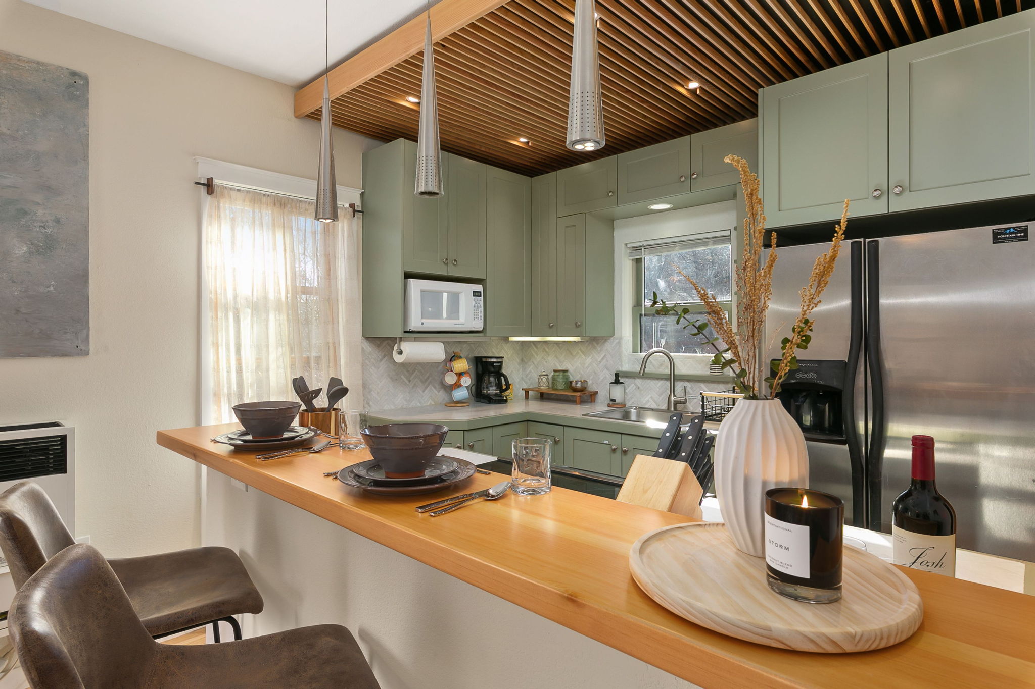 Bright and Airy Kitchen | Breakfast Bar with Seating for 3!