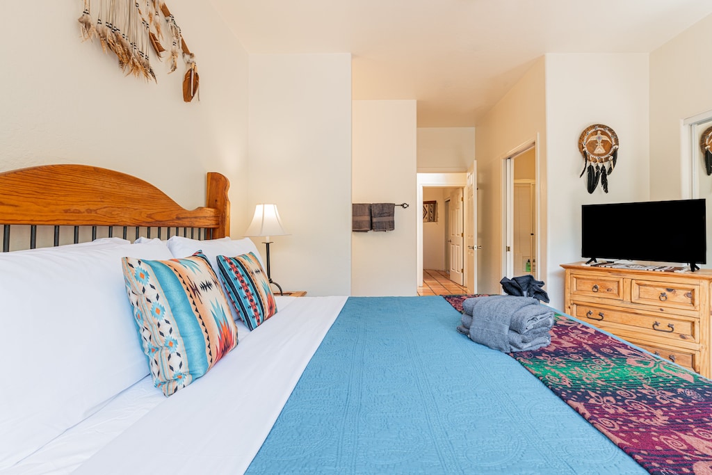 Master Bedroom with King Bed, Smart TV and En Suite Bathroom