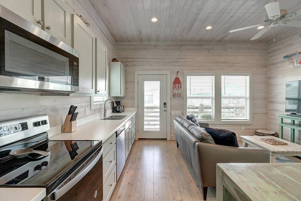 Welcome to the spacious and inviting open floor concept, where seamless transitions between the living room, kitchen, and dining area create a harmonious living space perfect for gatherings and relaxation.