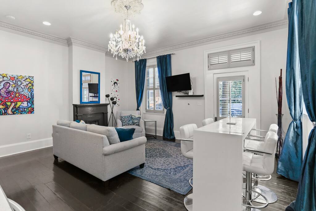 Open Concept Living, Dining and Kitchen area with sofa bed. 