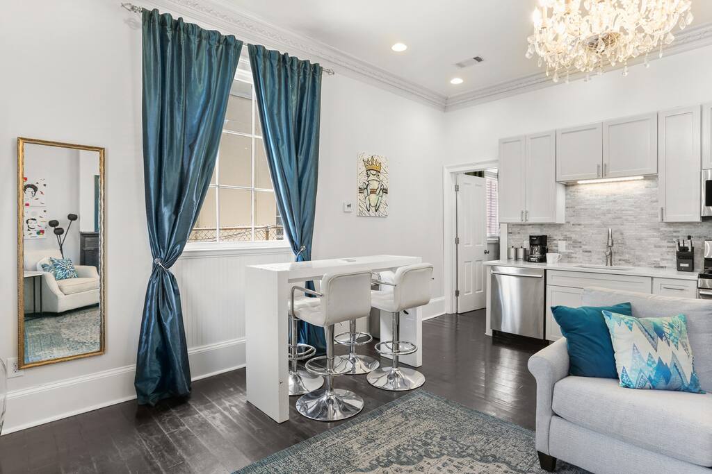 Open Concept Living, Dining and Kitchen area with sofa bed. 