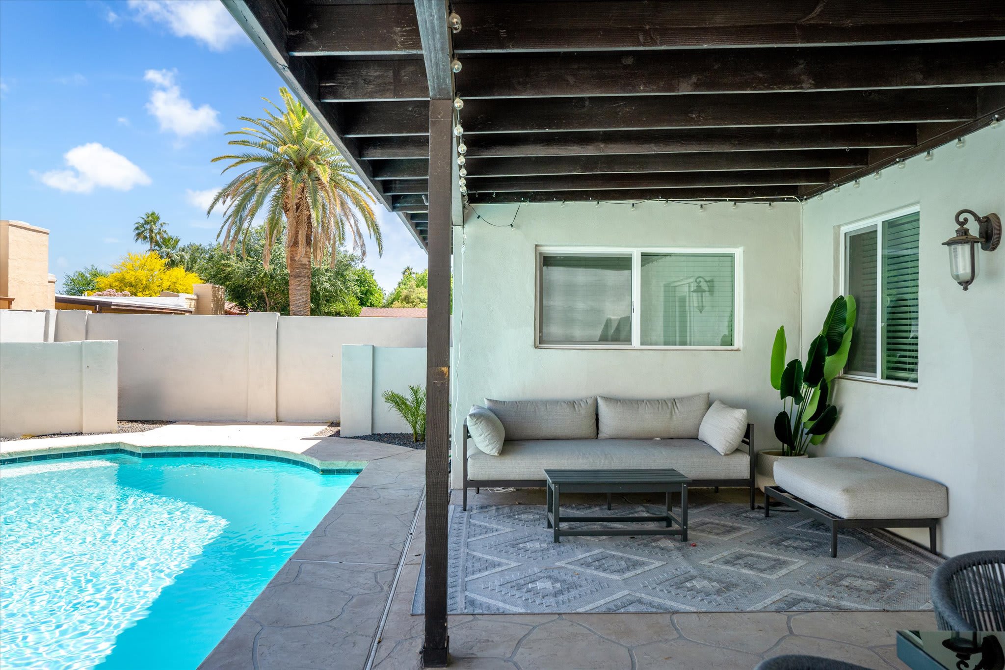 Lounge in style by the pool with comfy sofa