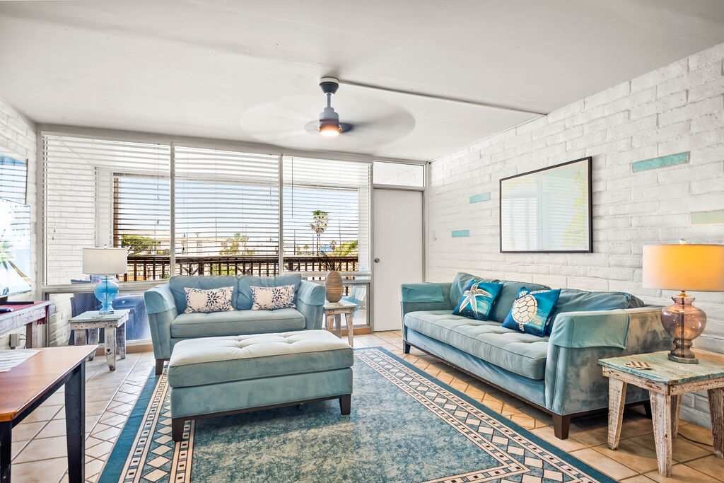 Relax in the cozy living room that opens up to a charming balcony — the perfect blend of indoor comfort and fresh air.
