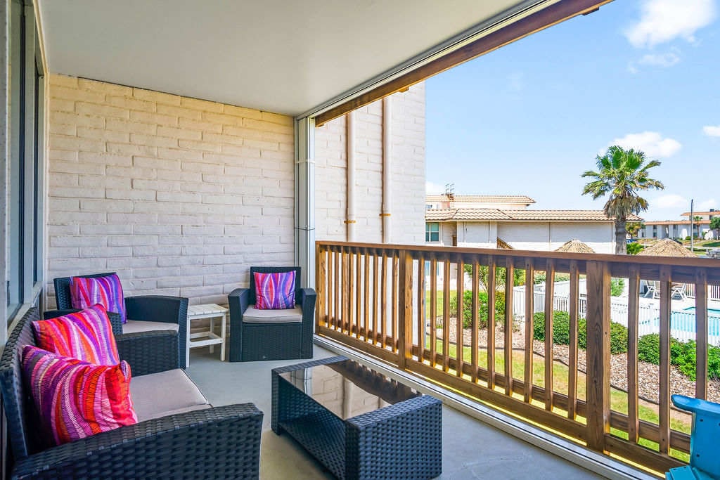 Relax on your private balcony’s cozy seating — the perfect spot to sip your morning coffee or unwind with sunset views.
