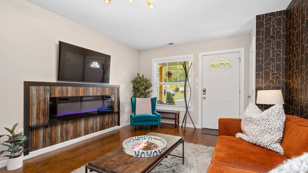 Dogwood's living room offers comfortable seating and a TV.