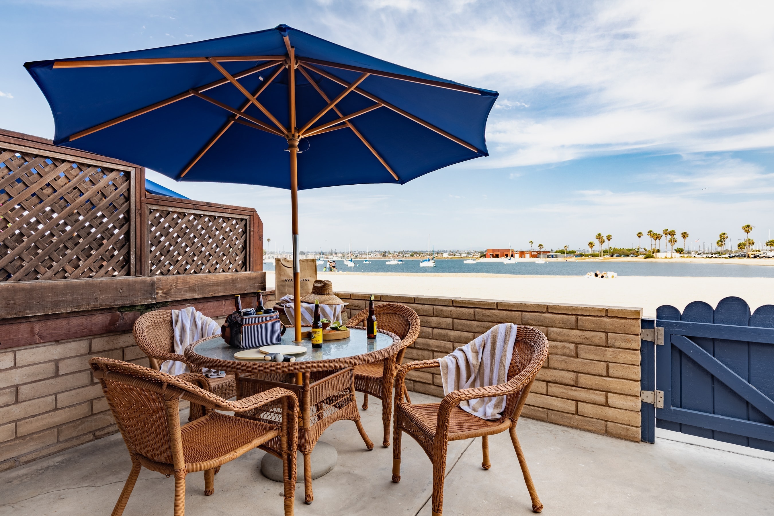 Patio features an outdoor dining area and leads directly to the beach. (Bayside 2)