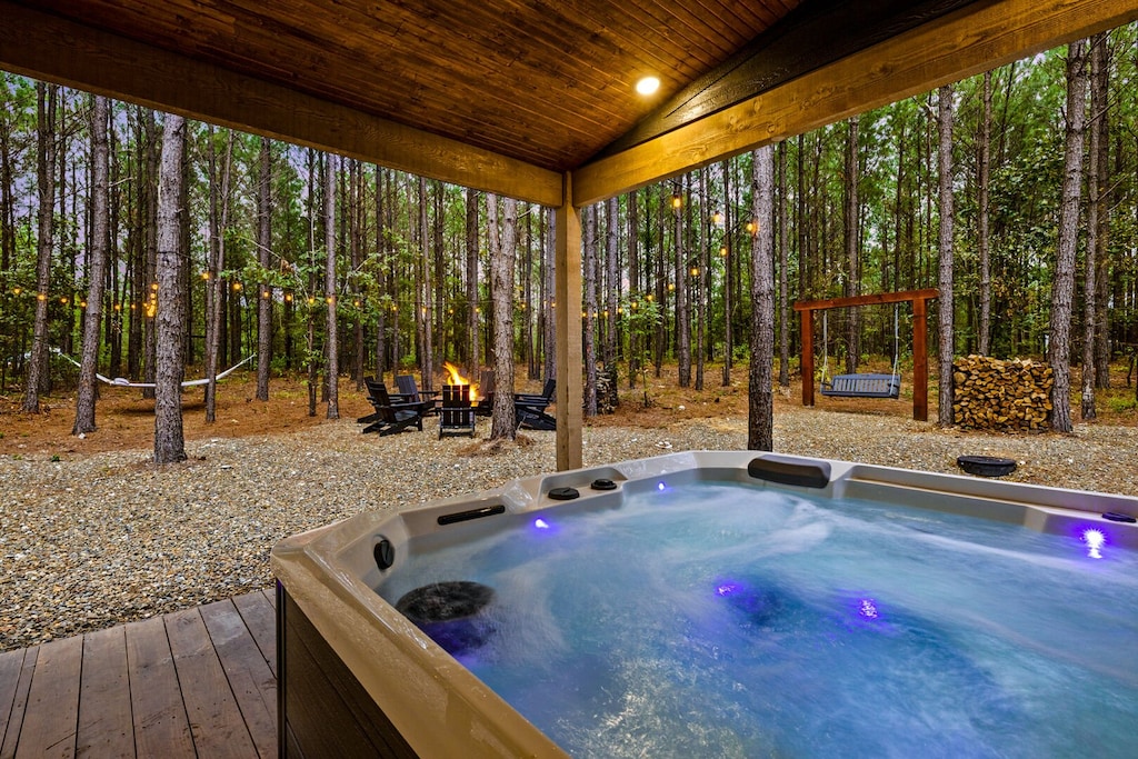 Hot tub by large patio table