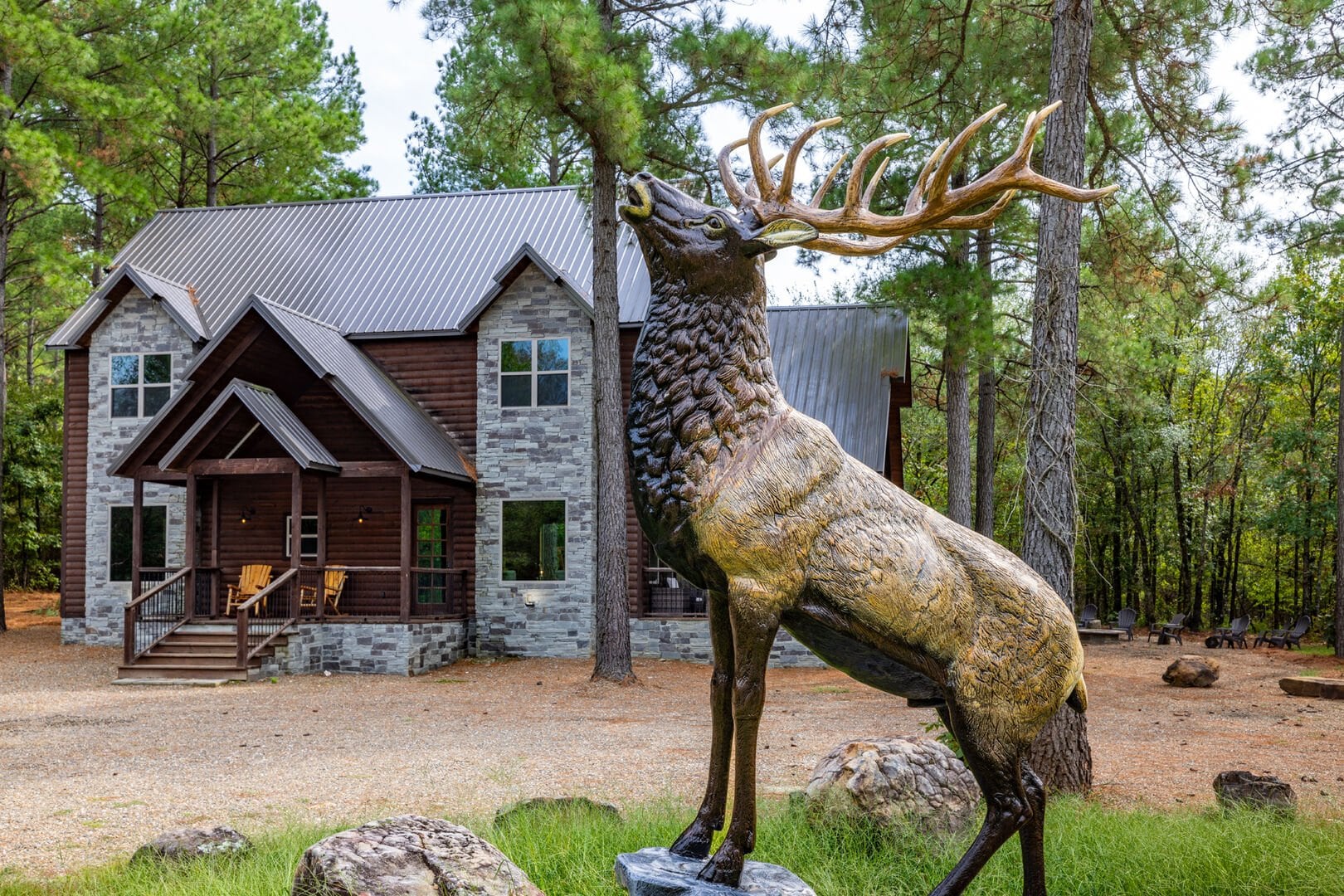 Close up of Elk statue at front of cabin