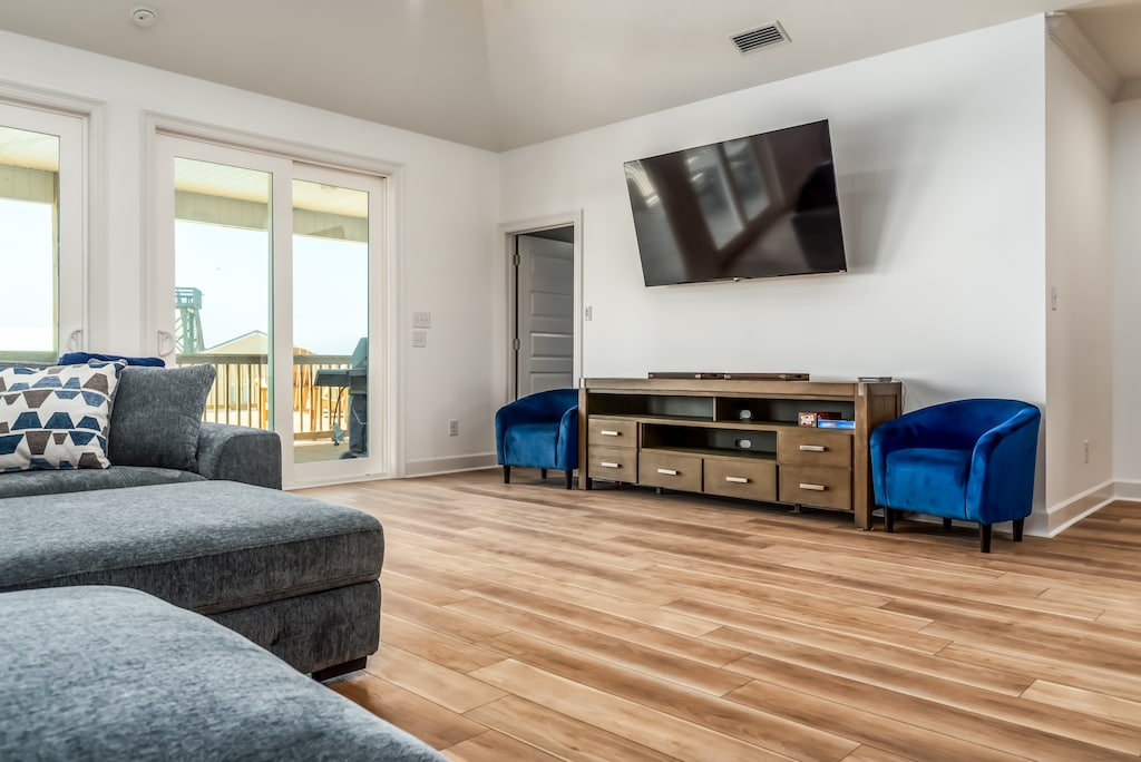 004 Blue Heaven Living Room with Large Flat Screen TV