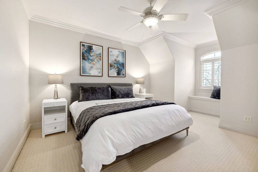 The second bedroom upstairs has a king bed, closet, and a nearby bathroom.