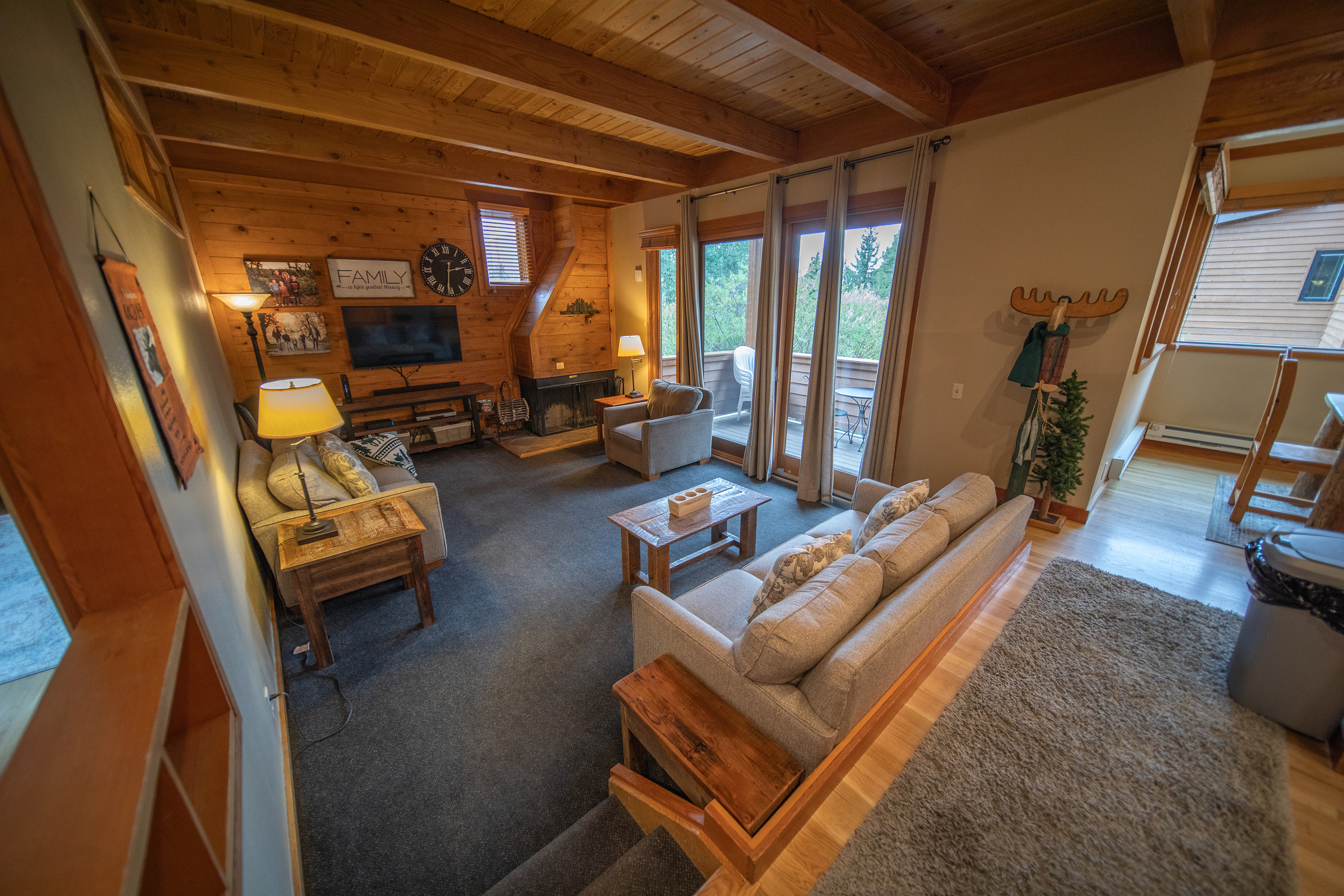 Living room with access to the private deck