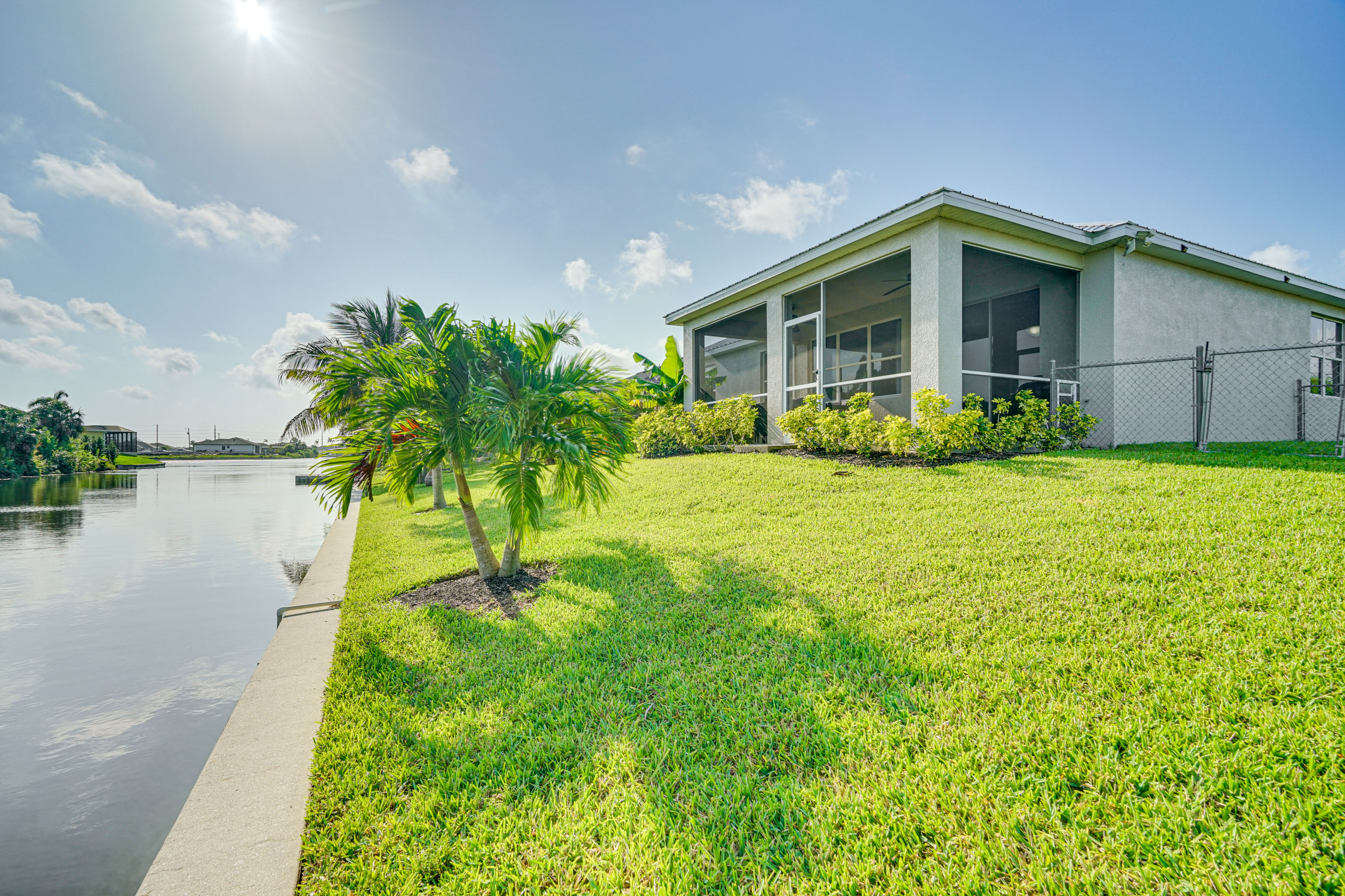 Property Image 1 - Bright Cape Coral Home w/ Sunroom & Canal Views!