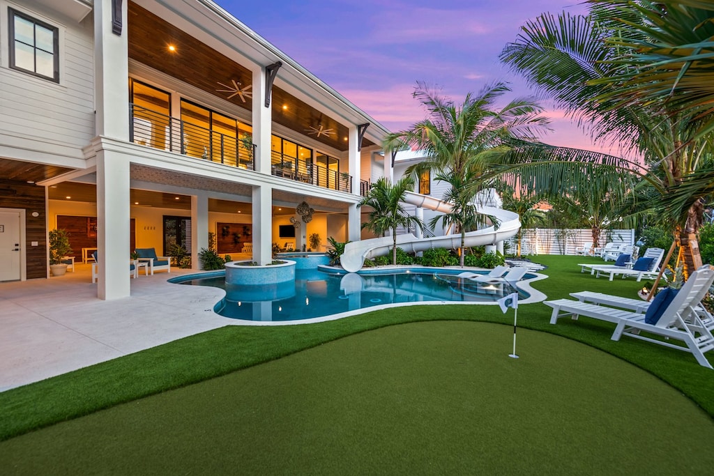 Twilight - Rear Elevation - Salty Oak - Water Slide - Resort Style Pool - Mini Golf & Golf Simulator.