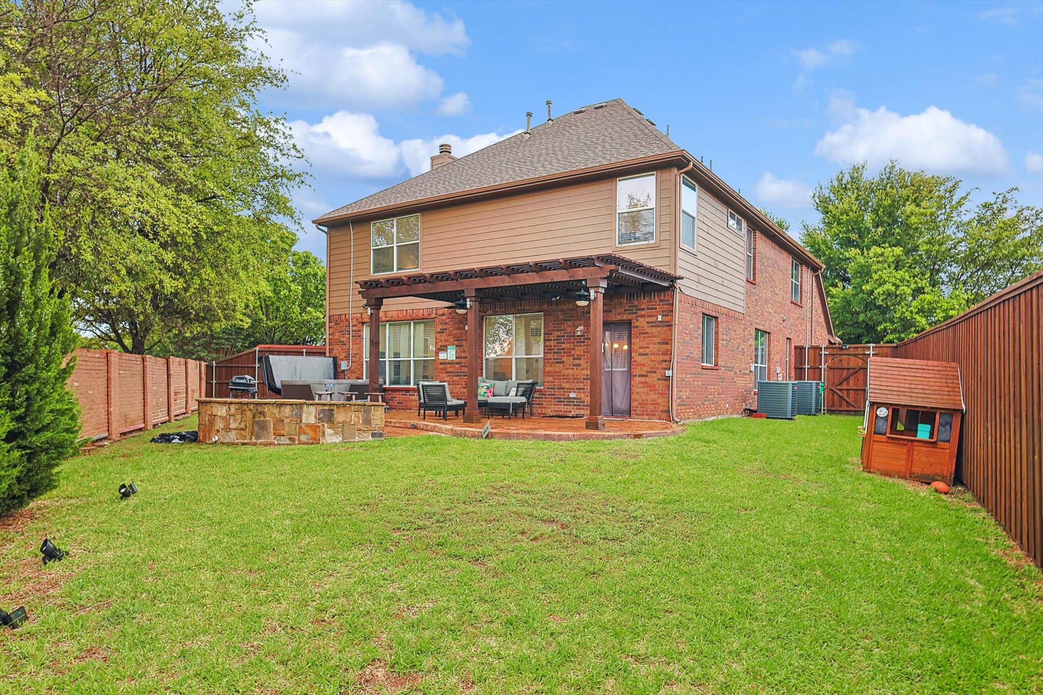 Welcome to your home away from home! Spacious and welcoming, this lovely brick two-story offers an elegant interior design and a backyard meant for entertaining.