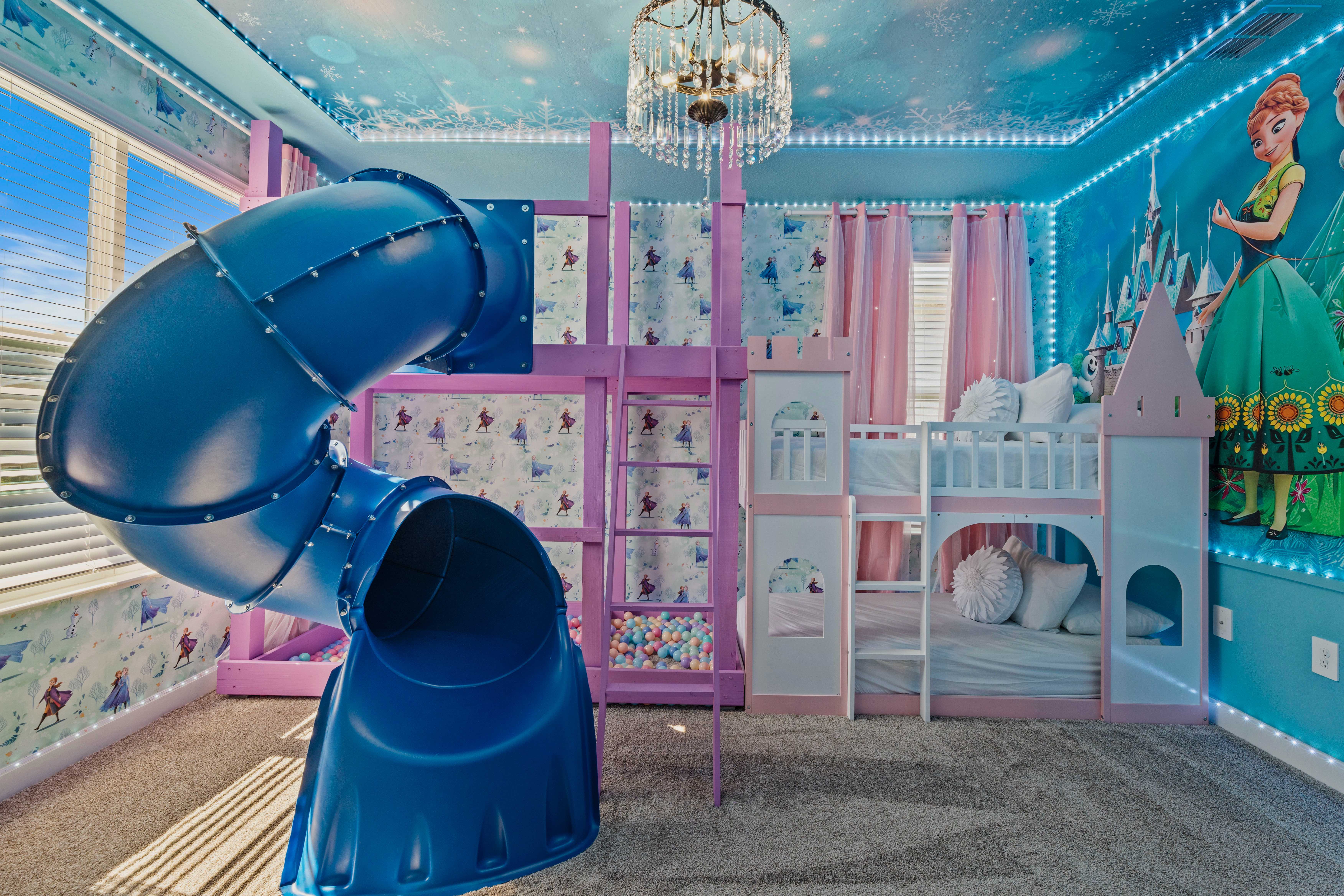 Frozen-themed bedroom of the Home in Davenport Florida - Featuring two bunk beds and a slide that promise excitement around every corner - Let fun begin little ones! - Play Area for fun and adventure