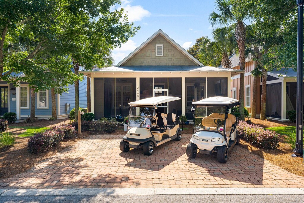 Front of Home & Two Golf Carts