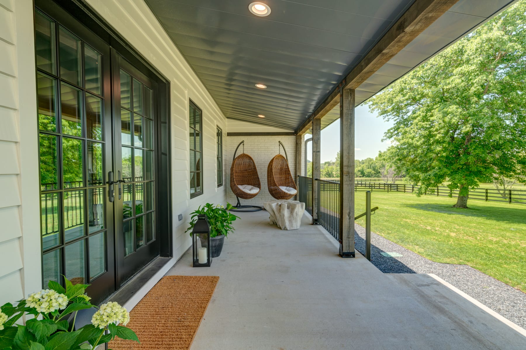 4. Serene and scenic front porch, facing the pond.