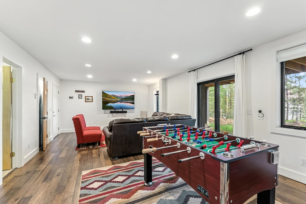 Family room: Smart TV with cable, Yamaha sound bar, foosball table, wet bar