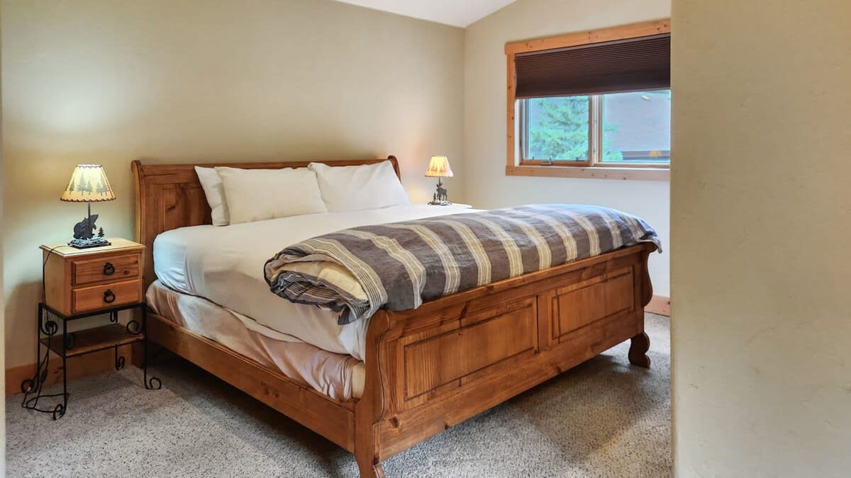 The home’s two additional bedrooms are found on the third floor of the home, with the first room featuring a comfortable king-size bed.